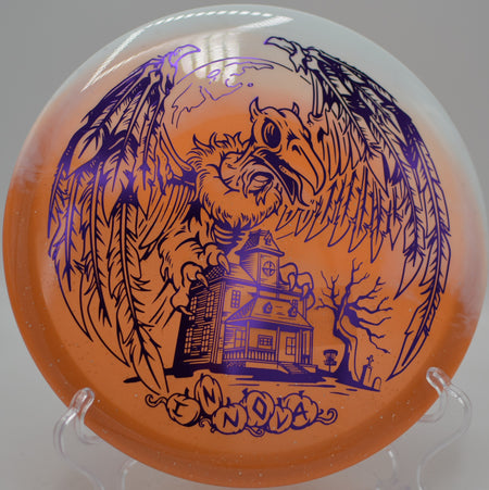 Halloween Roc3 Duo edition gliding long on a controlled approach at DeLaveaga Disc Golf Course in Santa Cruz, California.