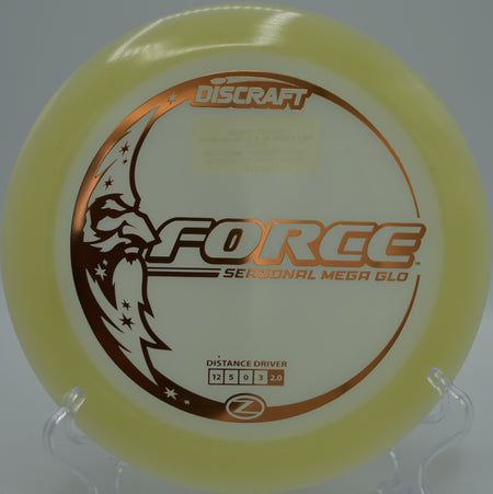 Mega Glow Z Force shining mid-flight on a power hyzer at Fountain Hills Disc Golf Course in Fountain Hills, Arizona.