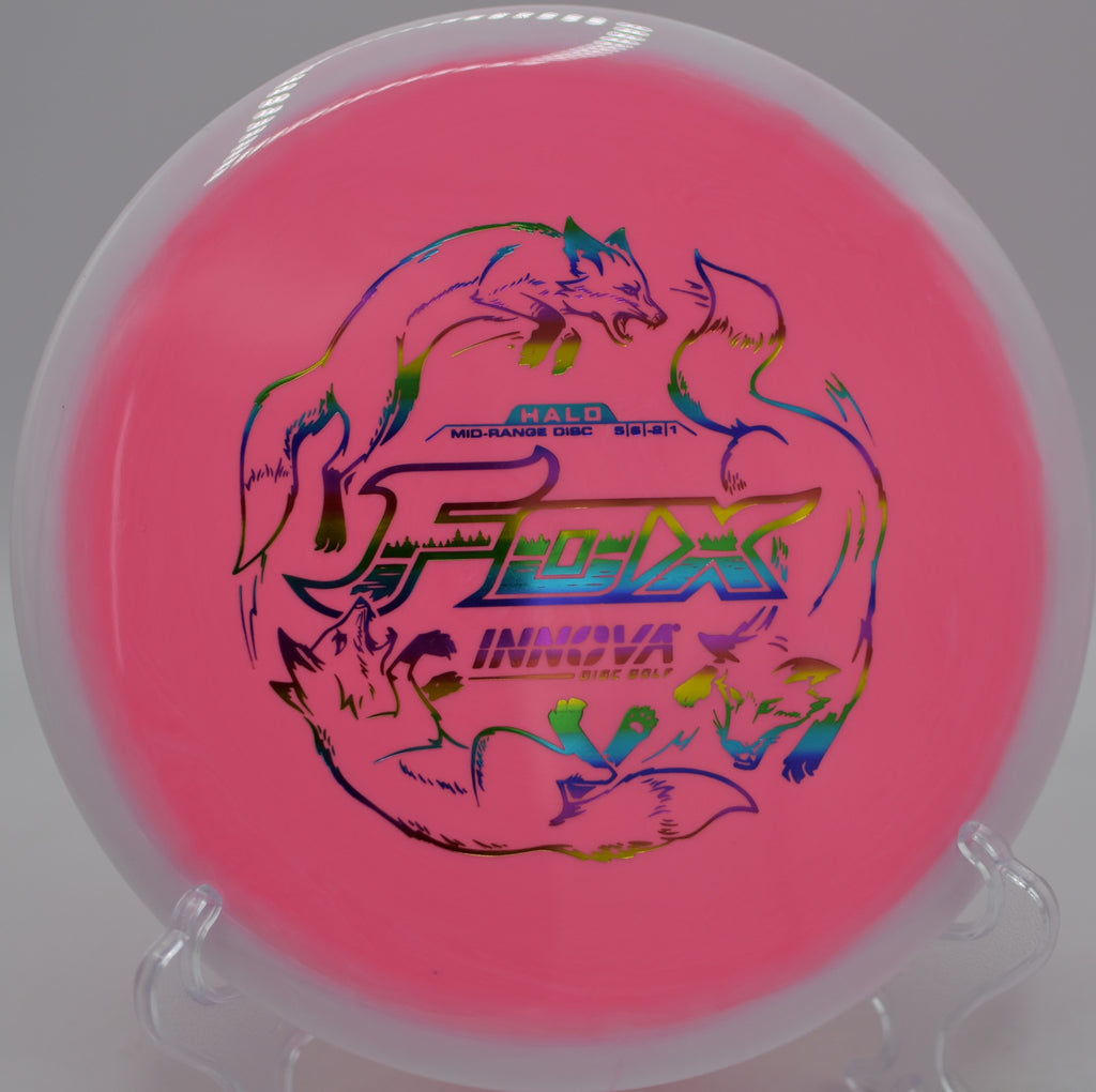 Player throwing a colorful Innova Halo Star Fox on a turnover line at Milo McIver State Park Disc Golf Course in Estacada, Oregon.