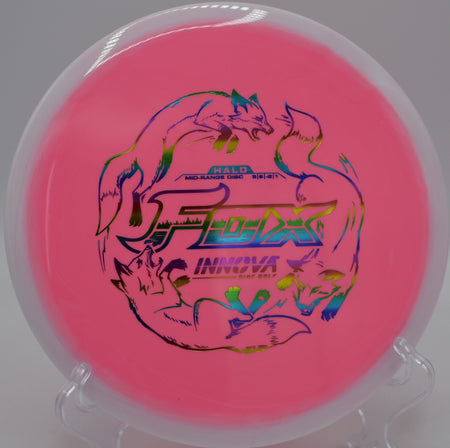 Player throwing a colorful Innova Halo Star Fox on a turnover line at Milo McIver State Park Disc Golf Course in Estacada, Oregon.