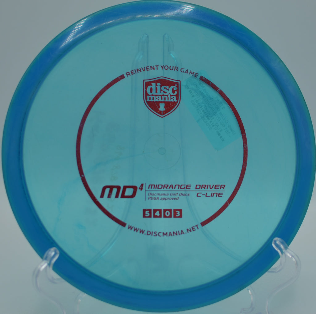 Used C-Line MD4 (Innova Made) showing light wear as it flies flat down the fairway at Maple Hill Disc Golf Course in Leicester, Massachusetts.

