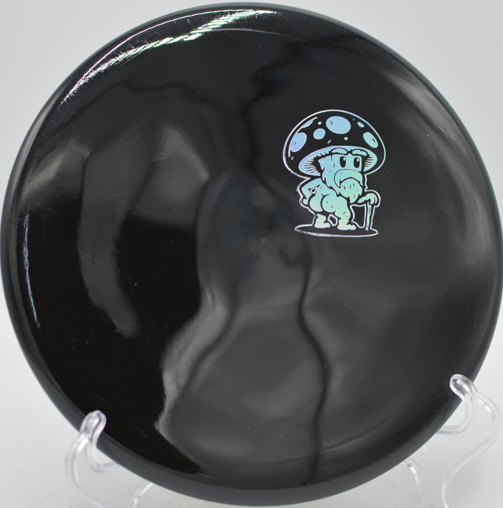 Doomsday Discs Rot Survival edition launched flat for a circle one approach at DeLaveaga Disc Golf Course in Santa Cruz, California.