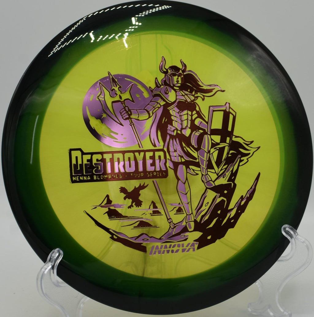 Innova Destroyer driver carving a long S-curve through open fairway at Harmon Hills Disc Golf Course in Fall Branch, Tennessee