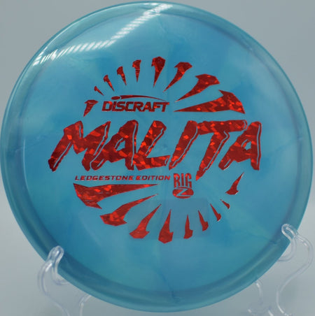 2026 Ledgestone Big Z Swirl Malita midrange carving a clean turnover line through tight trees at DeLaveaga Disc Golf Course in Santa Cruz, California