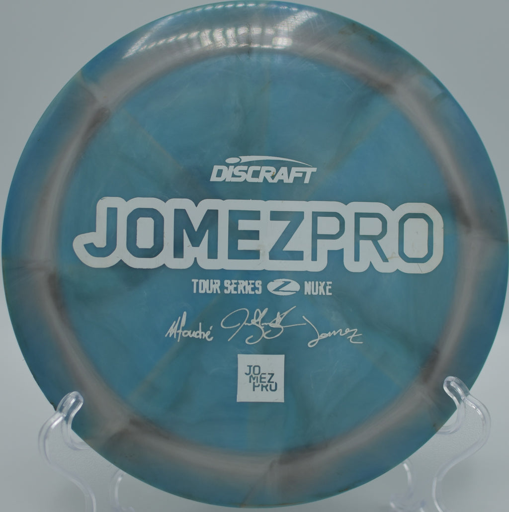 ZomeZPro Z Swirl Nuke gliding over the fairway at Fountain Hills Disc Golf Course in Fountain Hills, Arizona, highlighting its explosive speed and stable finish.
