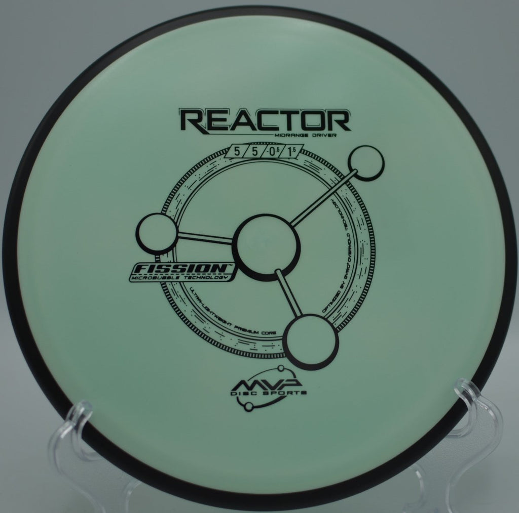 MVP Fission Reactor midrange carving a straight-to-fade line through tight gaps at Idlewild Disc Golf Course in Burlington, Kentucky