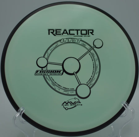 MVP Fission Reactor midrange carving a straight-to-fade line through tight gaps at Idlewild Disc Golf Course in Burlington, Kentucky
