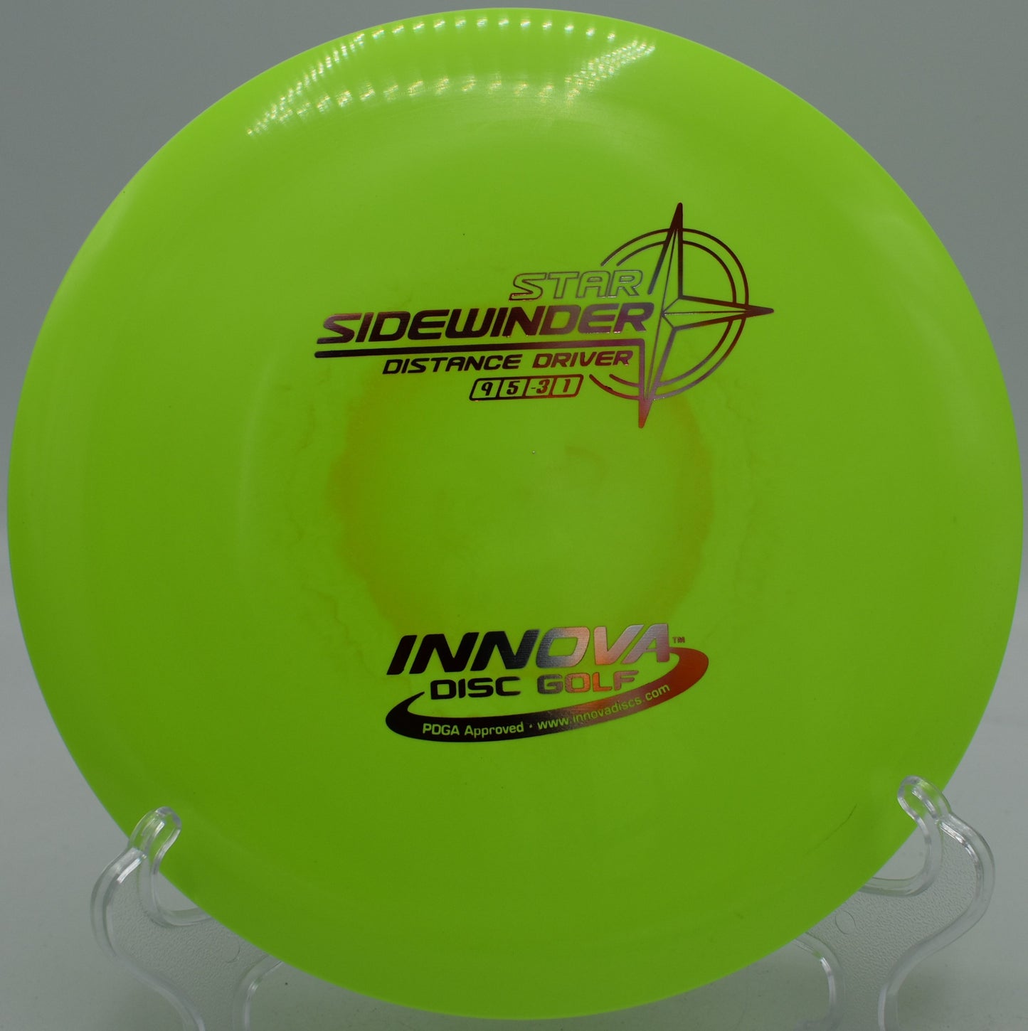 Right-hand backhand hyzer-flip throw using a Star Sidewinder at North Cove Disc Golf Course in Marion, North Carolina