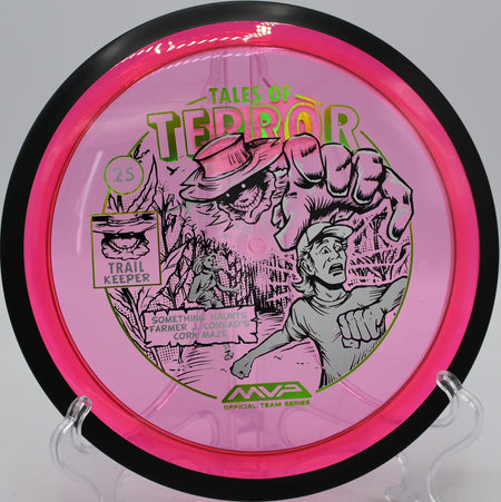 MVP Trail Proton disc with spooky 2025 artwork hugging an S-curve at Vira Disc Golf Course in Anchorage, Alaska