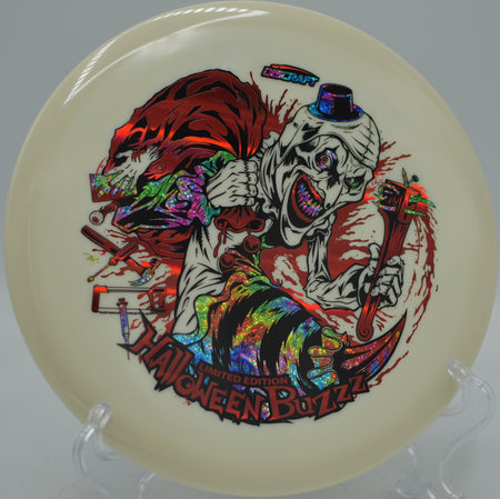 Limited Halloween 2025 Glo Buzzz triple stamp carving a tunnel shot at Moraine Gold Disc Golf Course in Portersville, Pennsylvania.