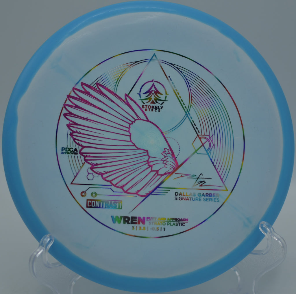 Contrast Strato Wren gliding cleanly toward the basket at Victor Ashe Park Disc Golf Course in Knoxville, Tennessee.