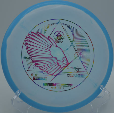 Contrast Strato Wren gliding cleanly toward the basket at Victor Ashe Park Disc Golf Course in Knoxville, Tennessee.