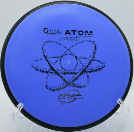MVP Electron Firm Atom putter staged for a spin putt on the green at White River Disc Golf Course in Auburn, Washington
