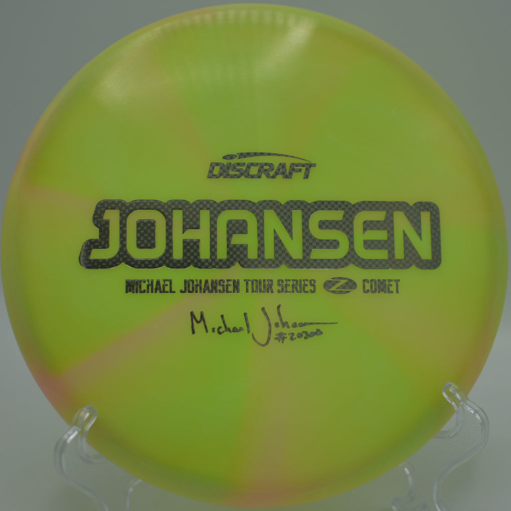 2020 Z-Swirl Comet (Michael Johansen) drifting effortlessly on a long, glidey turnover at Winthrop Gold Disc Golf Course in Rock Hill, South Carolina, highlighting its legendary touch and finesse.