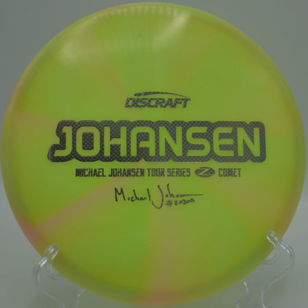 2020 Z-Swirl Comet (Michael Johansen) drifting effortlessly on a long, glidey turnover at Winthrop Gold Disc Golf Course in Rock Hill, South Carolina, highlighting its legendary touch and finesse.