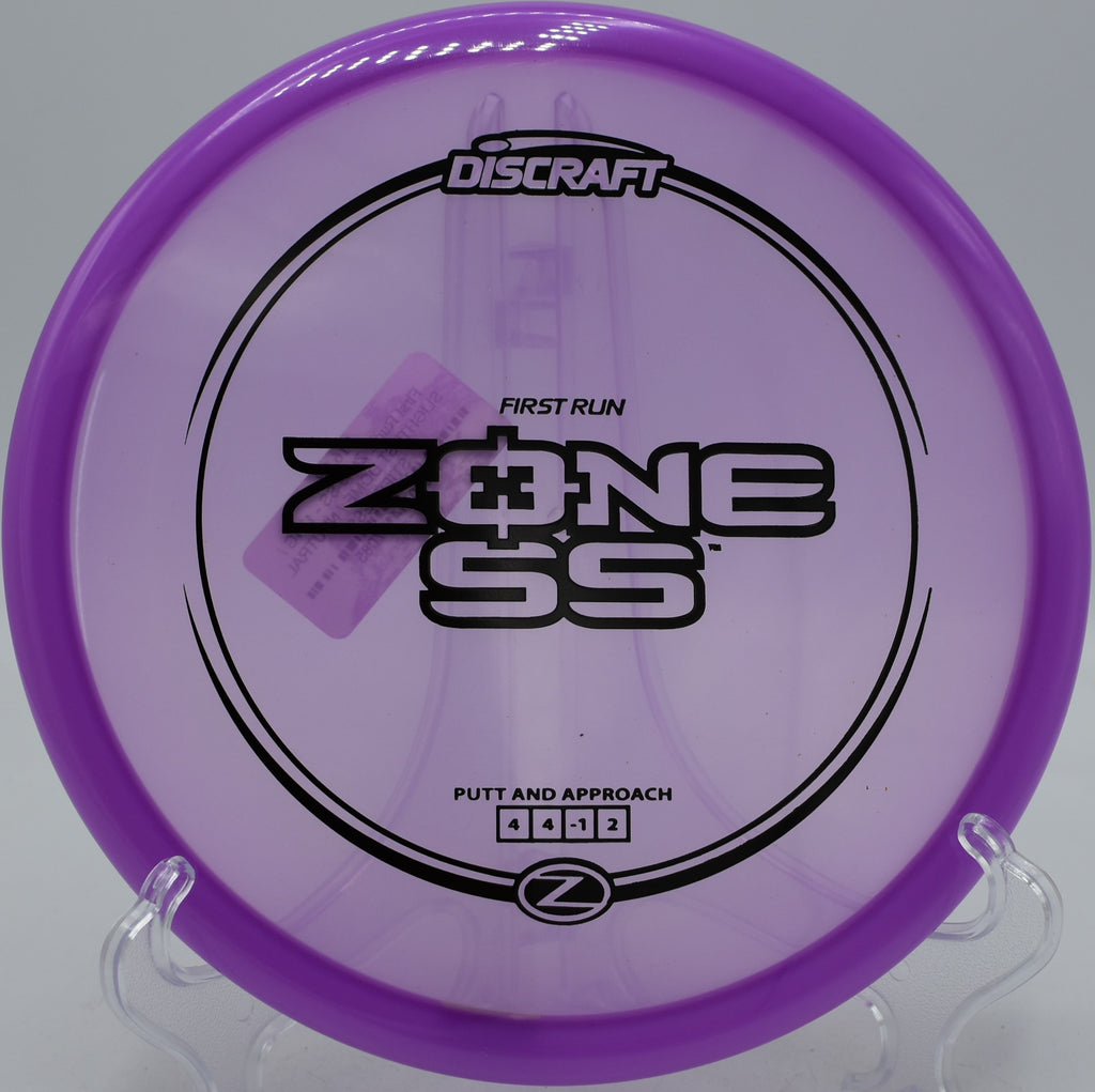 Discraft Z Zone SS popping out of tight woods at Trophy Club DGC in Texas