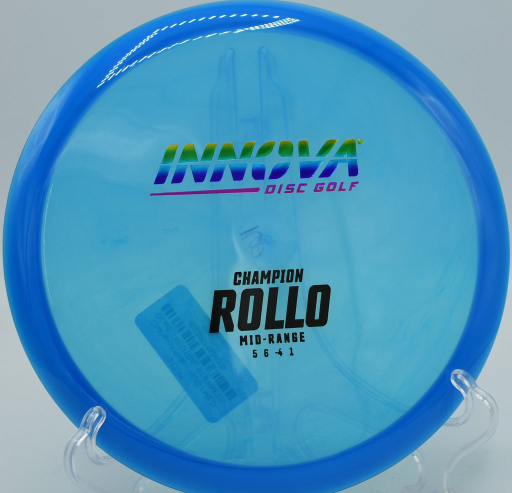 Champion plastic Rollo midrange releasing clean on a hyzer flip at Maple Hill Disc Golf Course, MA