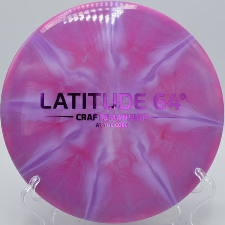 Gold-Ice Burst Claymore Latitude 64° Craftsmanship midrange threading wooded gaps at Moraine State Park Disc Golf Course in Portersville, Pennsylvania.