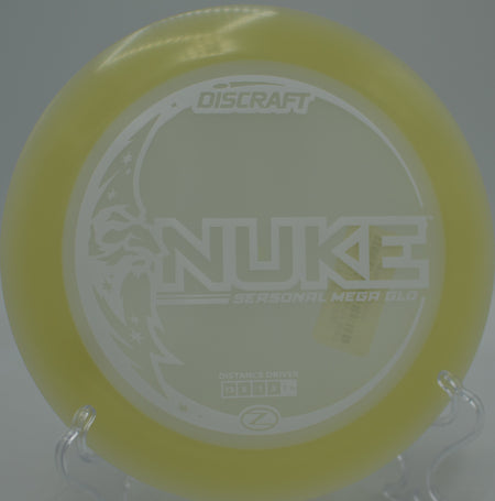 Mega Glow Seasonal Nuke flying flat and stable through the woods at Hornets Nest Disc Golf Course in Charlotte, North Carolina.