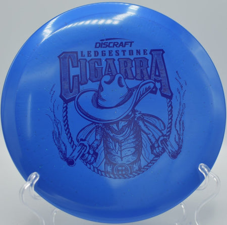 Discraft Cigarra Ti Sparkle fairway driver carving a controlled turnover line on a technical hole at DeLaveaga Disc Golf Course in Santa Cruz, California