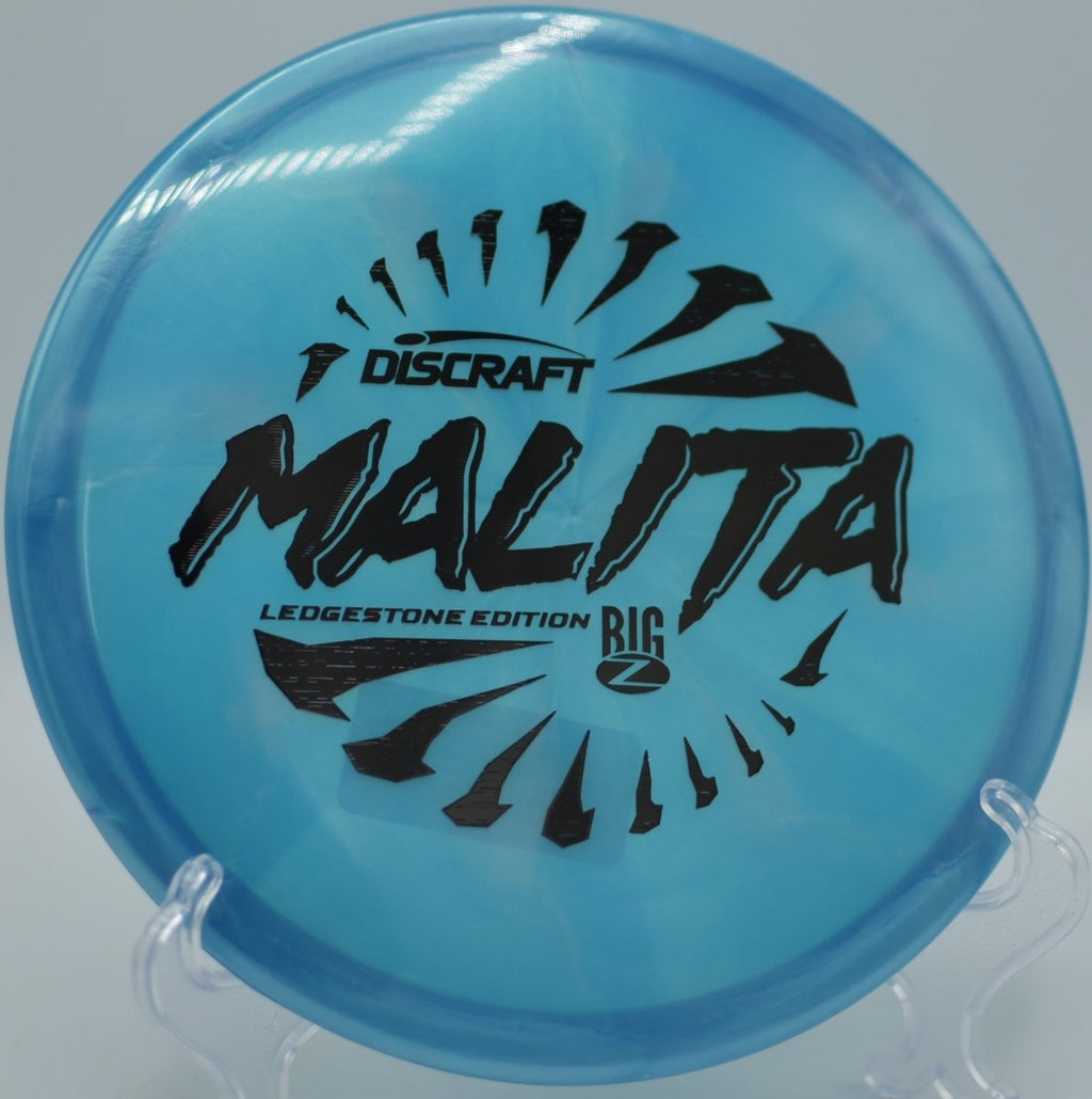 Discraft Big Z Swirl Malita midrange executing a precision placement shot at Maple Hill Disc Golf Course in Leicester, Massachusetts