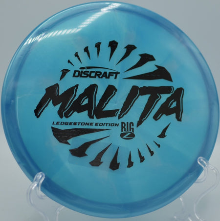Discraft Big Z Swirl Malita midrange executing a precision placement shot at Maple Hill Disc Golf Course in Leicester, Massachusetts