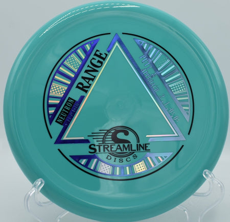 MVP Neutron Soft Range approach disc staged for a short tap-in putt at Lakewood Park Disc Golf Course in Fort Pierce, Florida