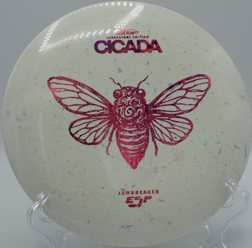Jawbreaker ESP Cicada spinning down a wooded fairway at Hornets Nest DGC in Charlotte, North Carolina, ideal for turnover midrange shots and line control.

