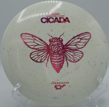 Jawbreaker ESP Cicada spinning down a wooded fairway at Hornets Nest DGC in Charlotte, North Carolina, ideal for turnover midrange shots and line control.

