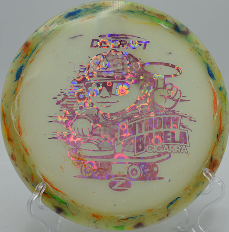 Discraft AB Cigarra in Jawbreaker Z Glo plastic, lighting up the fairway at The Preserve, Clearwater MN