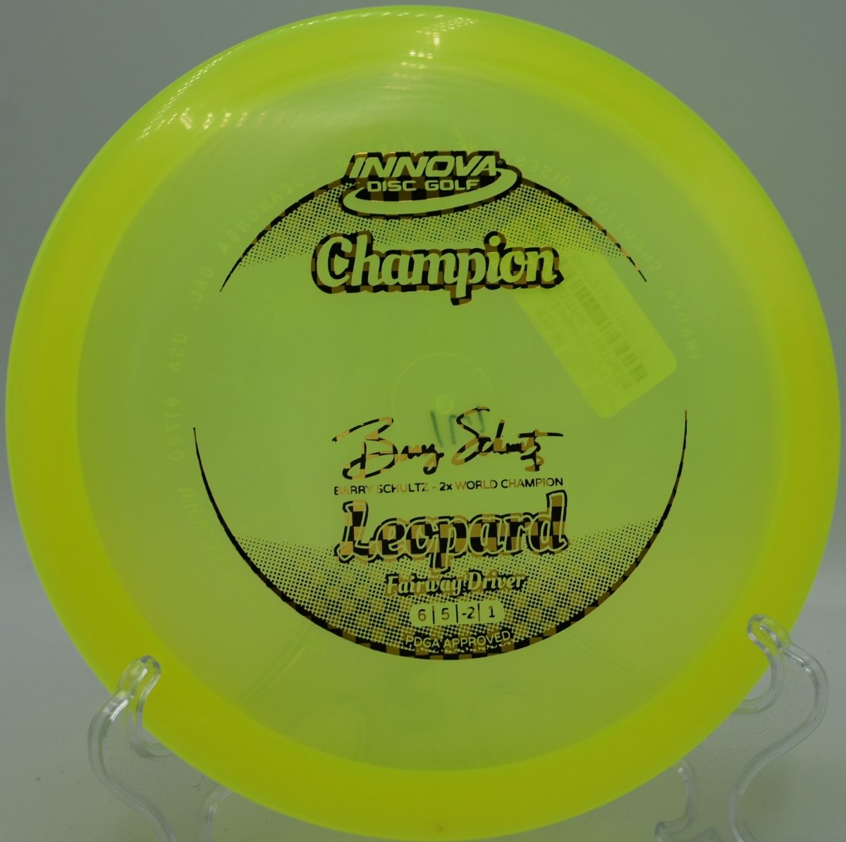 Champion Leopard fairway driver gliding on a long turnover line across fairway at Lake Claiborne State Park Disc Golf Course in Homer, Louisiana
