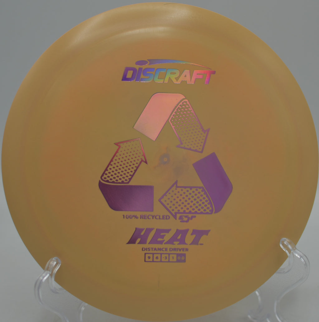 Discraft Recycled Heat holding a long, straight flight over dry terrain at Estrella Mountain Park Disc Golf Course in Goodyear, Arizona.