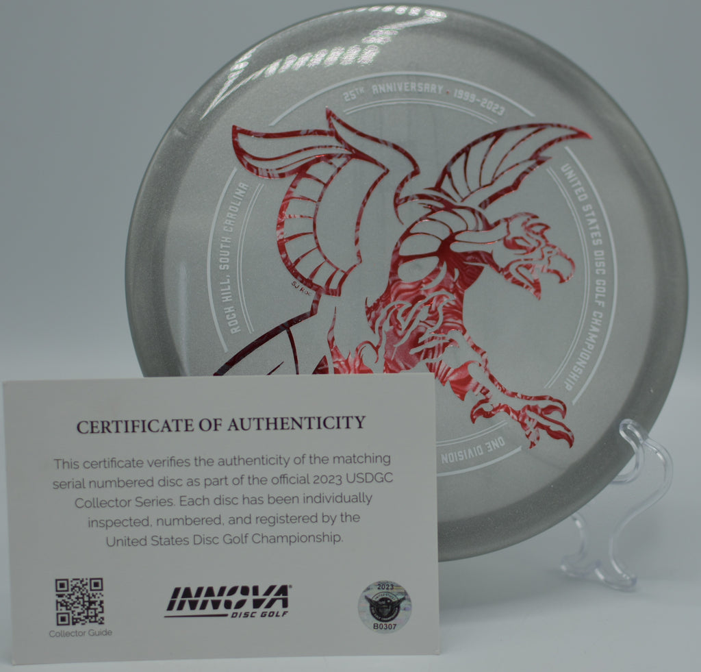 2023 USDGC Moondust Rancho Roc (With COA) displayed under sunlight at Winthrop Gold Disc Golf Course in Rock Hill, South Carolina, showcasing its shimmering Moondust plastic and collectible Certificate of Authenticity.