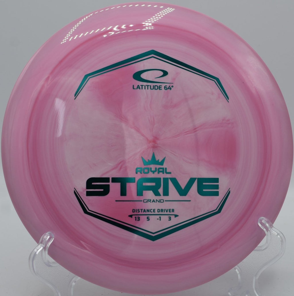 Grand Strive distance driver photographed on wooded fairway at Idlewild Disc Golf Course in Burlington, Kentucky