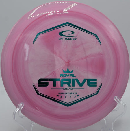 Grand Strive distance driver photographed on wooded fairway at Idlewild Disc Golf Course in Burlington, Kentucky
