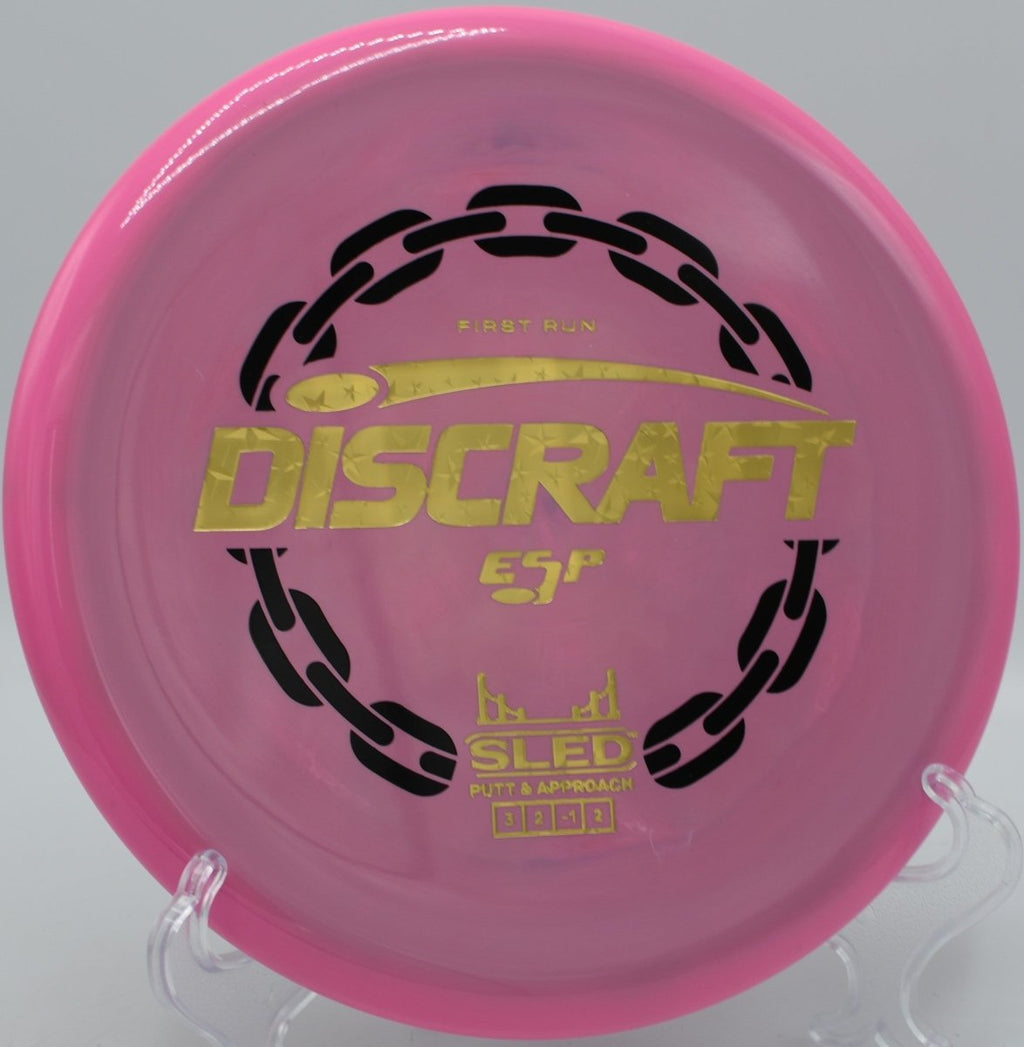 Discraft First Run ESP Sled stable putter drive finishing near pin at McDade Park Disc Golf Course in Scranton, Pennsylvania