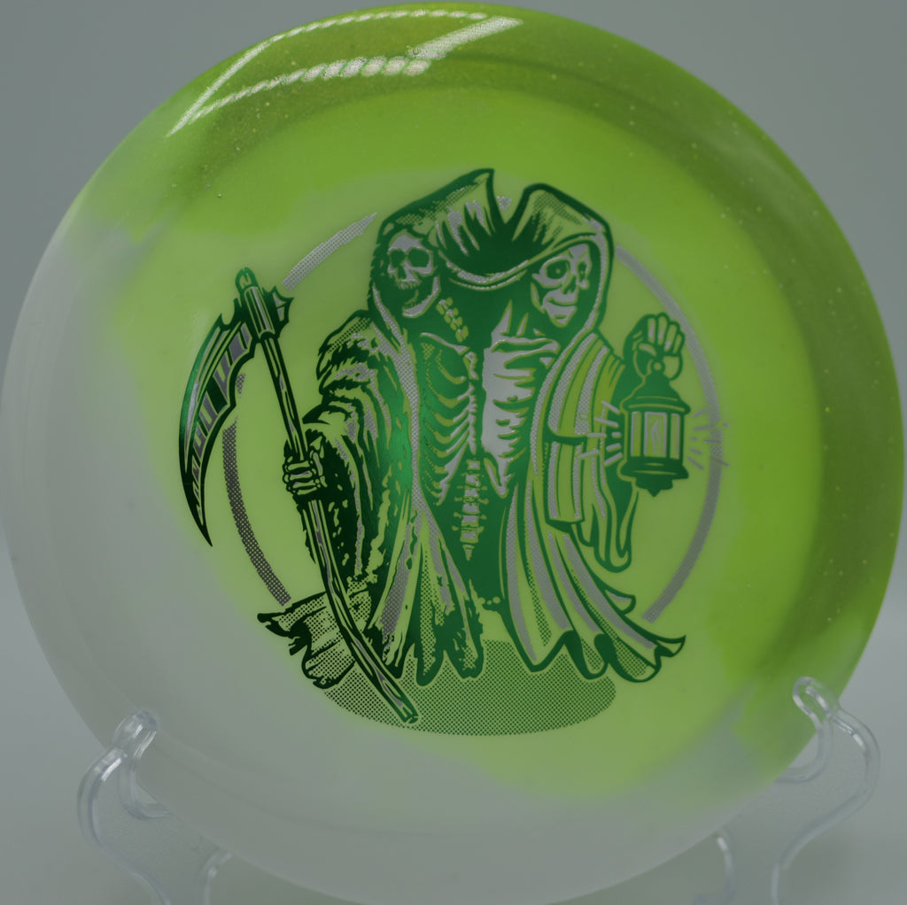 Innova Duo Wraith sitting near the basket at Lakeside Hills DGC in Olathe, KS, capturing its balanced flight window and torque resistance.