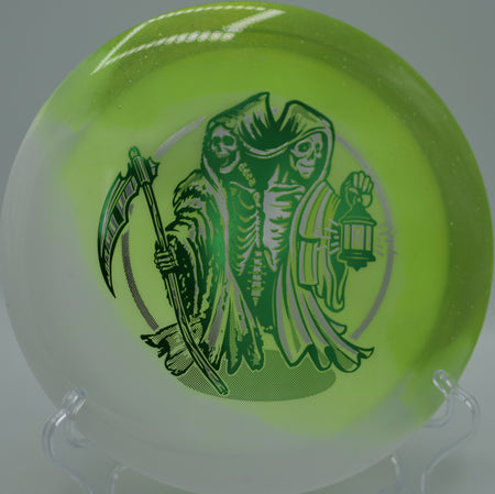 Innova Duo Wraith sitting near the basket at Lakeside Hills DGC in Olathe, KS, capturing its balanced flight window and torque resistance.