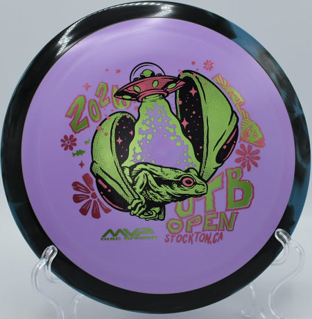 Axiom Delirium Fission plastic OTB Open edition driver lying on tee pad at Blue Ribbon Pines Disc Golf Course in East Bethel, Minnesota