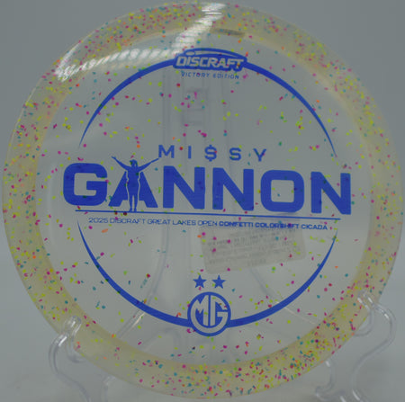 Missy Gannon Victory Edition Z CS Confetti Cicada parked under the basket at Rollin Ridge Disc Golf Course in Reedsville, Wisconsin.
