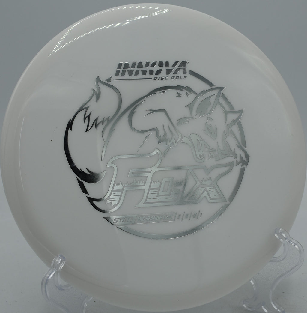 Innova Star Fox reliable midrange parked under the basket at Water Works Park Disc Golf Course in Kansas City, Missouri.
