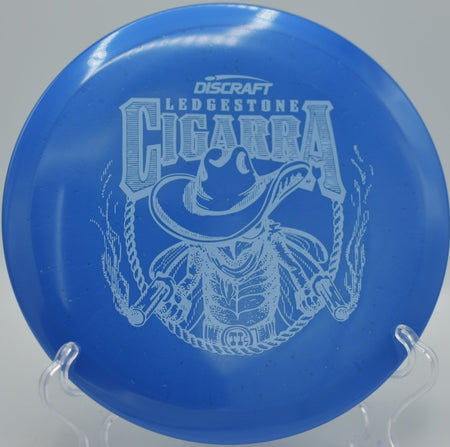 2026 Ledgestone Edition Ti Sparkle Cigarra delivering high glide and reliable finish on a fairway drive at Maple Hill Disc Golf Course in Leicester, Massachusetts