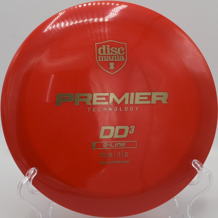 Discmania Q-Line DD3 driver resting in fairway grass after a powerful backhand bomb at The Rez Disc Golf Course in Brandon, Mississippi