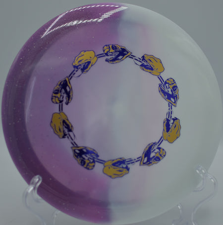 Innova Duo Mamba carving a roller at Swope Park DGC in Kansas City, KS, standing up quickly and riding a full-fairway turnover line.