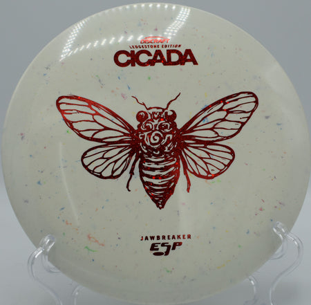 Discraft Cicada in Jawbreaker ESP plastic held in a fan grip at Idlewild Disc Golf Course in Burlington, Kentucky, perfect for woods golf and glide.

