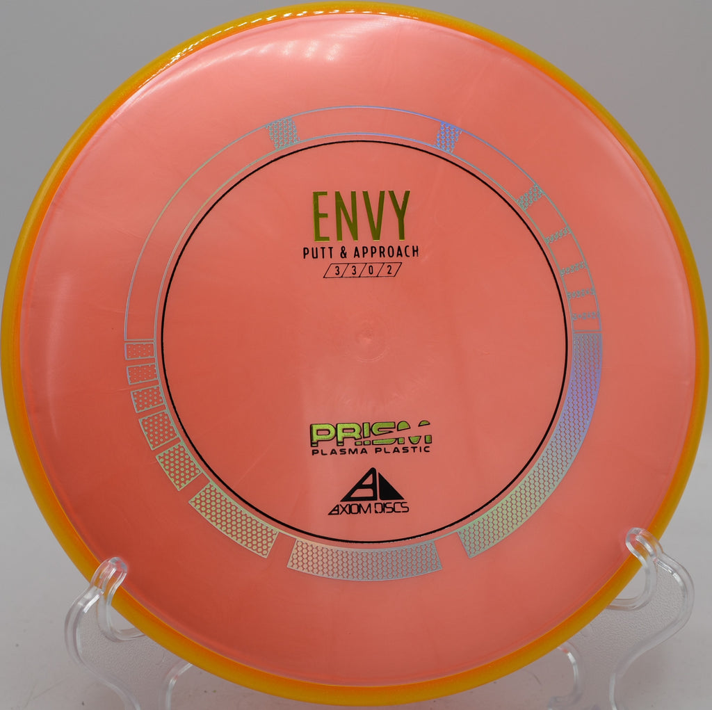 Prism Plasma Envy mid-range drive holding a smooth hyzer at Blue Ribbon Pines in East Bethel, Minnesota.