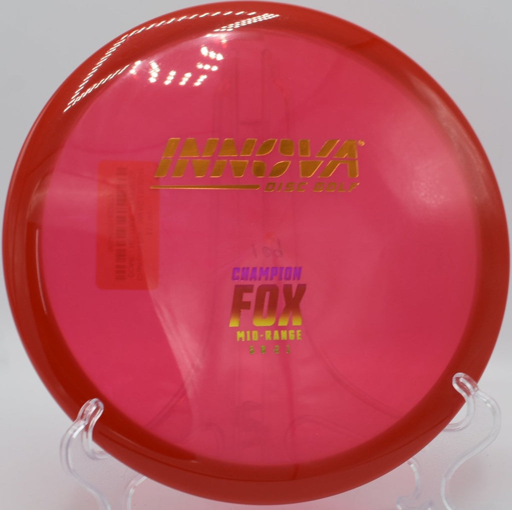 Innova Champion Fox midrange staged on tee pad for a precision midrange drive at Mahr Park Disc Golf Course in Madisonville, Kentucky