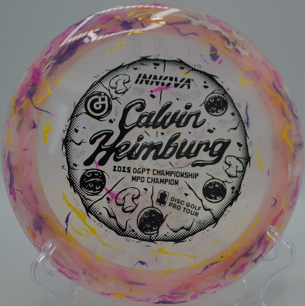 Bright Party Time Destroyer soaring under blue skies at North Fort Myers Community Park Disc Golf Course in North Fort Myers, Florida.