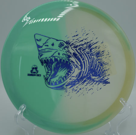 Understable Retina Glow Chemtrail positioned on a wooded fairway at Black Bear DGC in Branson, MO, built for smooth shaping shots.