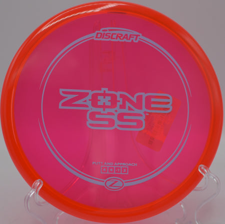 Discraft Z Zone SS gliding with reduced fade at Rollin Ridge Disc Golf Course in Reedsville, Wisconsin.